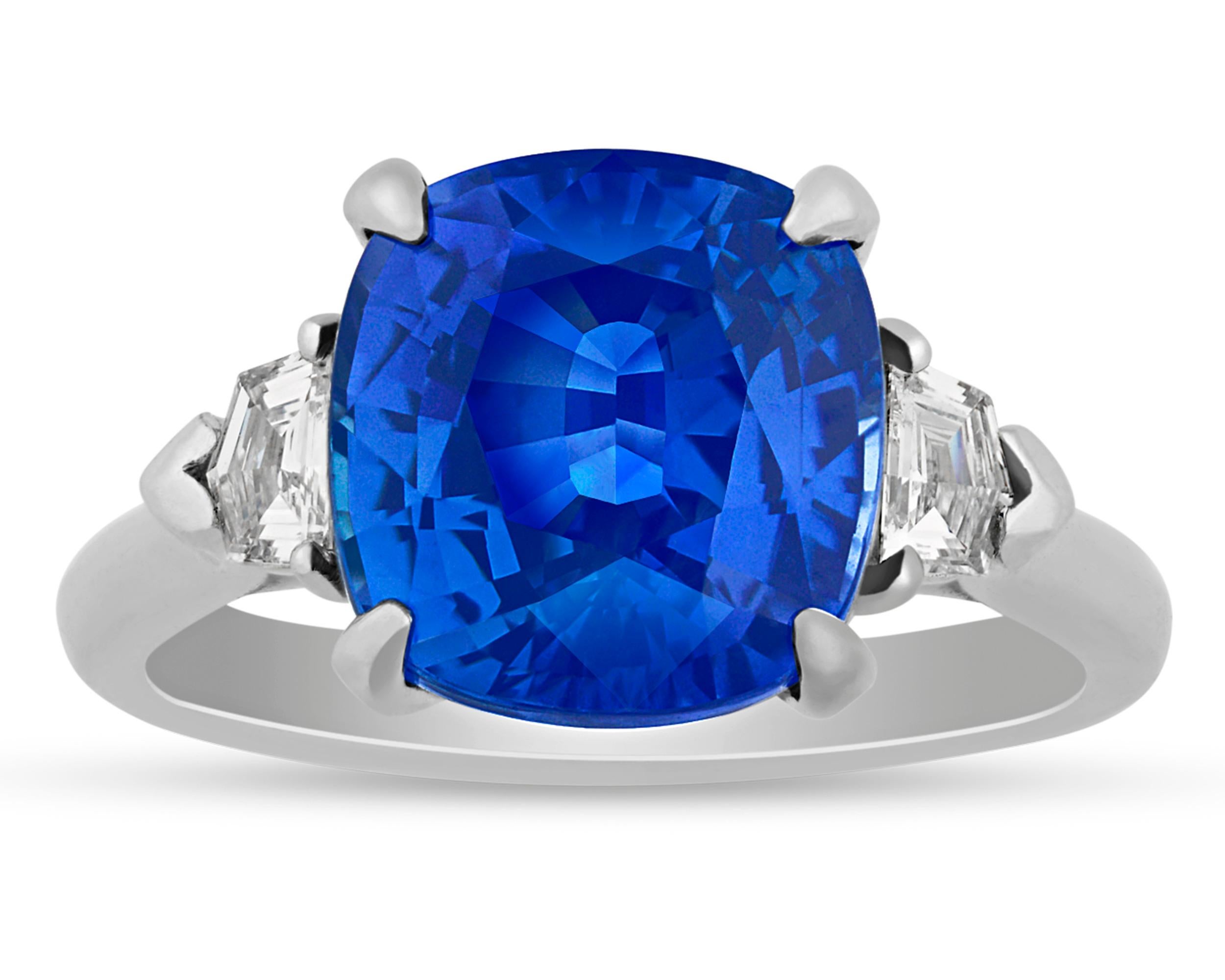 Ceylon sapphires are renowned for their pure, rich blue hue, and this example displays all of the best attributes of this coveted gemstone. Weighing 5.74 carats, the sapphire is flanked by diamonds totaling 0.74 carat in its platinum setting. GIA