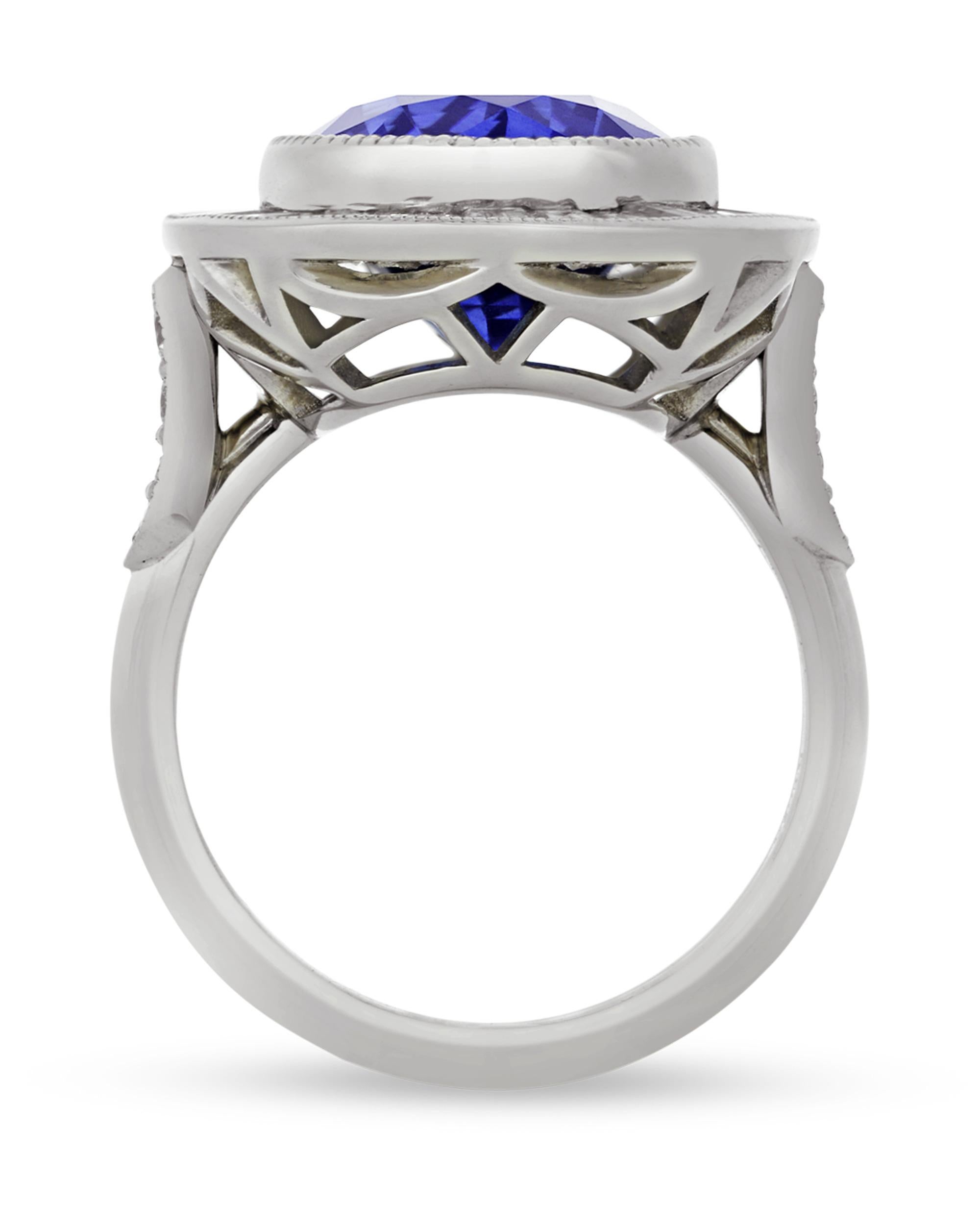 A brilliant-cut sapphire displays a deep royal blue hue in this elegant ring. The 7.10-carat sapphire at the heart of this classic ring is certified by the Gemological Institute of America (GIA) as being Ceylon in origin. Displaying the rich blue