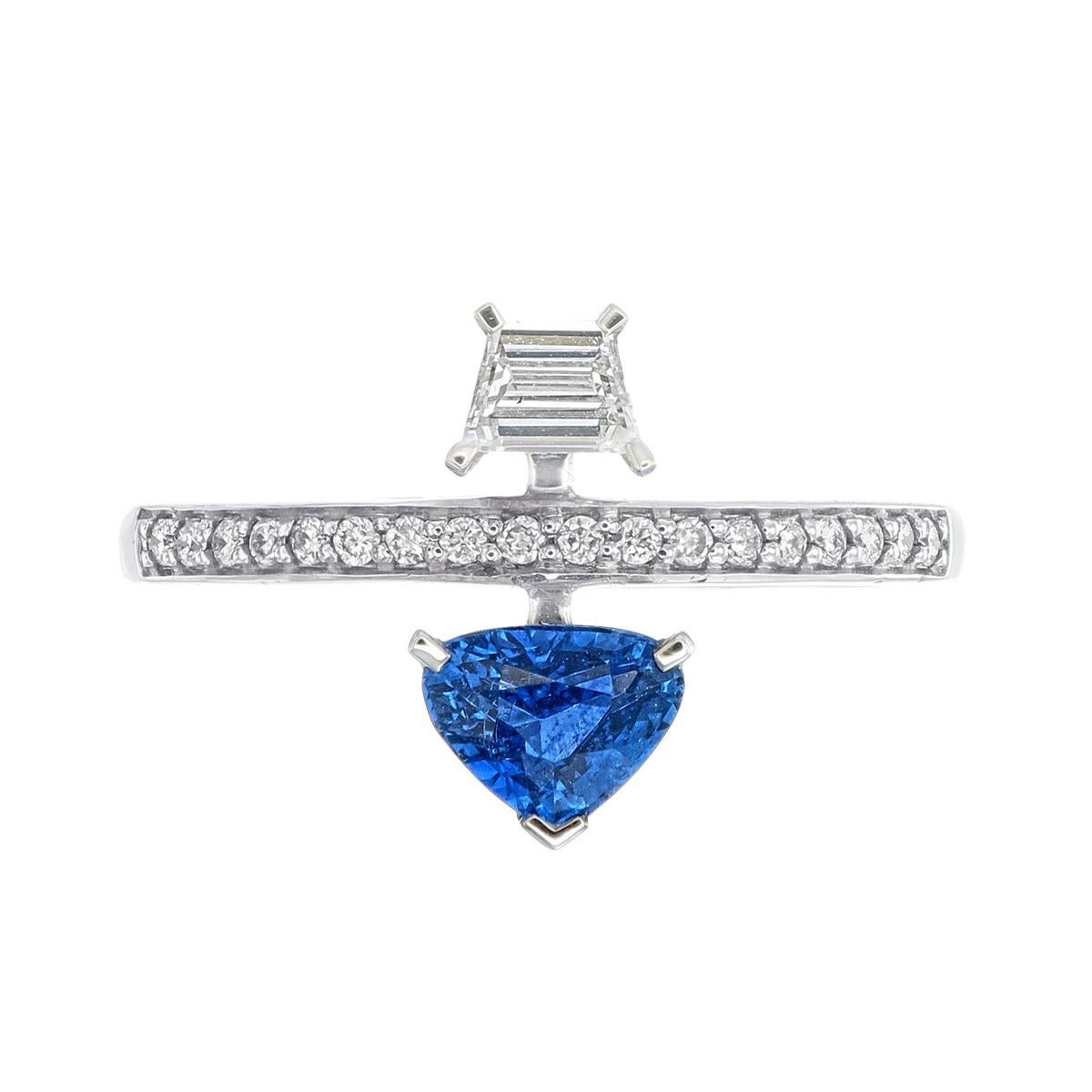 18kt white gold sapphire ring with diamonds
  
  Gold colour & karat: White gold 18kt
  Weight: 3.315 grams
  
  Set with-
  Stone type: Sapphire
  Shape: -
  Carat: 0.68 
  Colour: -
  Clarity: -
  
  Surrounding Stones: Diamonds
 1) Side Trapezoid