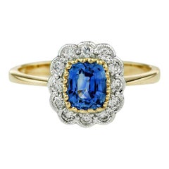 Vintage-Halo-Ring aus Gelbgold mit Ceylon-Saphir und Diamant