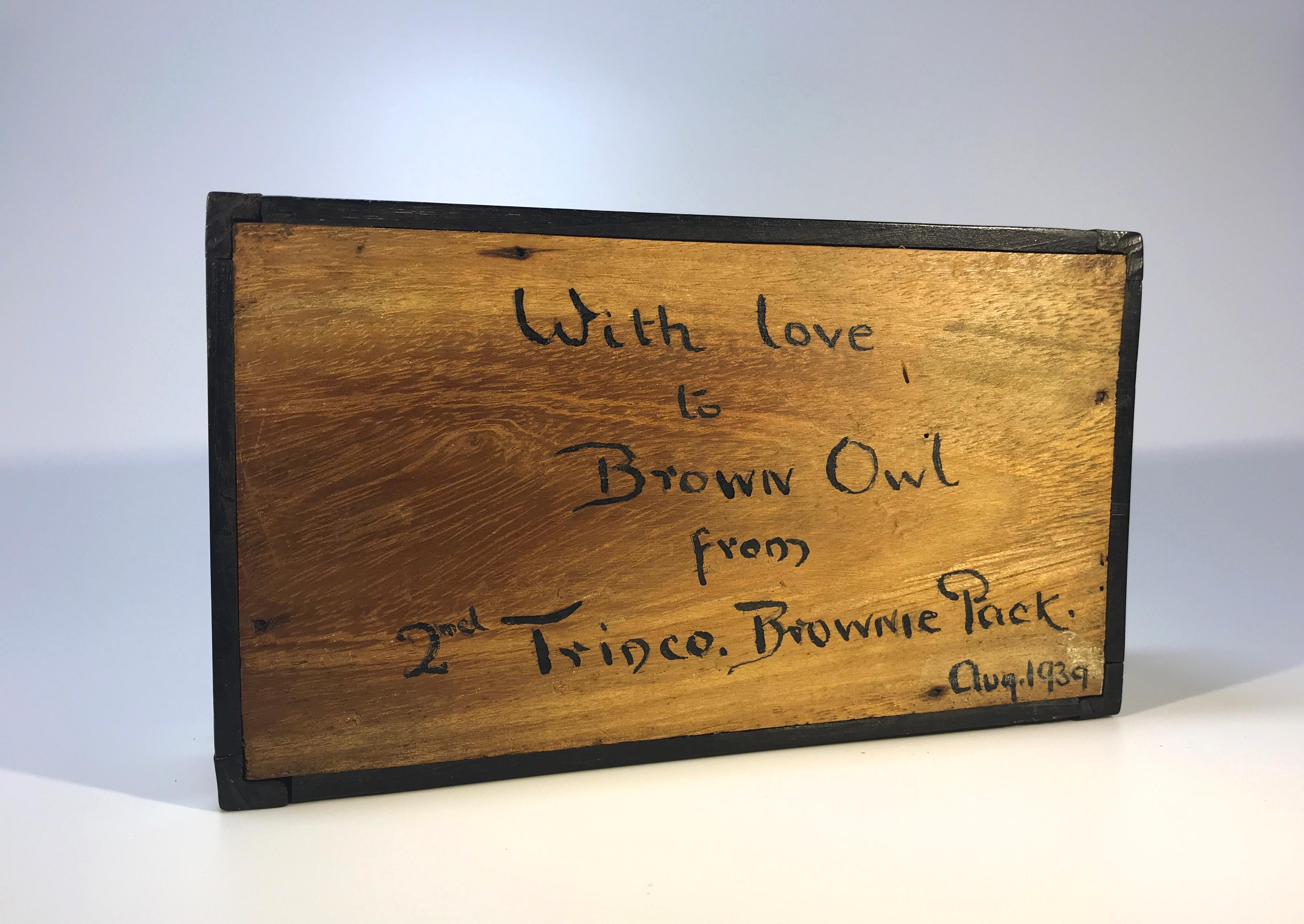Charming Ceylonese rectangular porcupine quill box with ebonized casing and inlaid bone decoration. The sliding lid reveals a plain cedar wood interior.
Delightful handwritten message on base 'With love to Brown Owl from 2nd Trinco Brownie Pack,