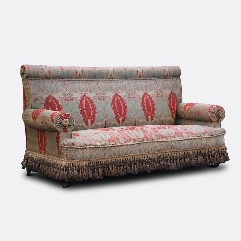 C.F.A. Voysey (1857-1941) Arts & Crafts upholstered sofa, circa 1900

A magnificent and extremely rare sofa covered in original ‘The Owl’ woollen fabric designed by renowned Arts & Crafts architect and designer C. F. A. Voysey, woven by Alexander