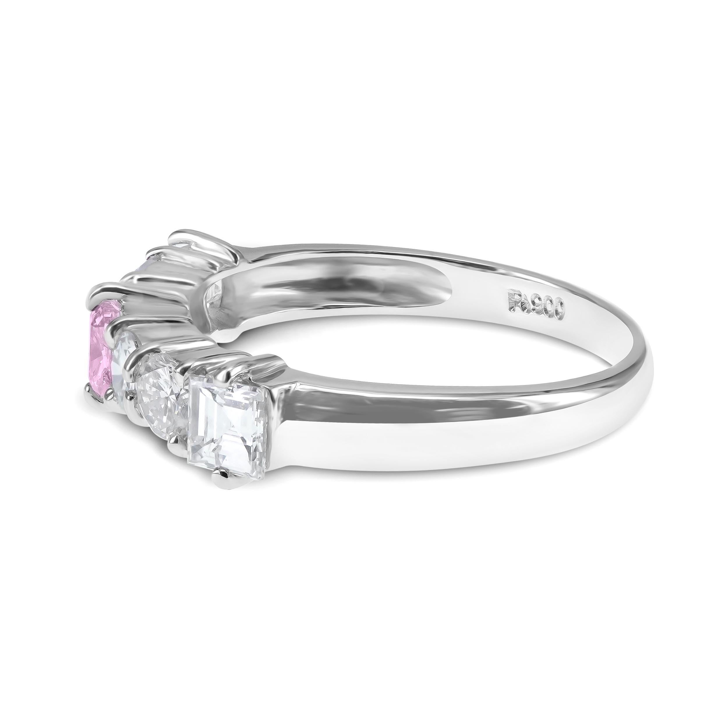 A CGL Certified 0.19 carat Fancy Pink Diamond is set along with 0.82 carat of white brilliant round and radiant cut diamond. Pink diamonds are some of the most alluring fancy diamonds on the market. Due to their extreme rarity, pink diamonds are