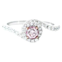 Anello con diamante certificato CGL da 0,20 carati di colore rosa tenue con purezza VS1