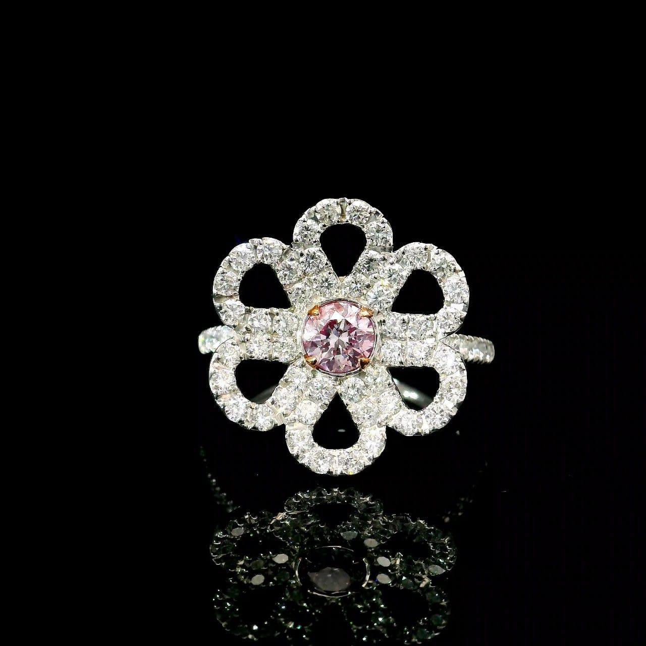 18kt white gold ring with diamonds
  
  Gold colour & karat: White gold 18kt
  Weight: 4.047 grams
  
  Set with-
  Stone type: Diamonds
  Shape: Round
  Carat: 0.34
  Colour: Very Light Pink
  Clarity: I1
  
  Surrounding Stones: Diamonds
 1) White