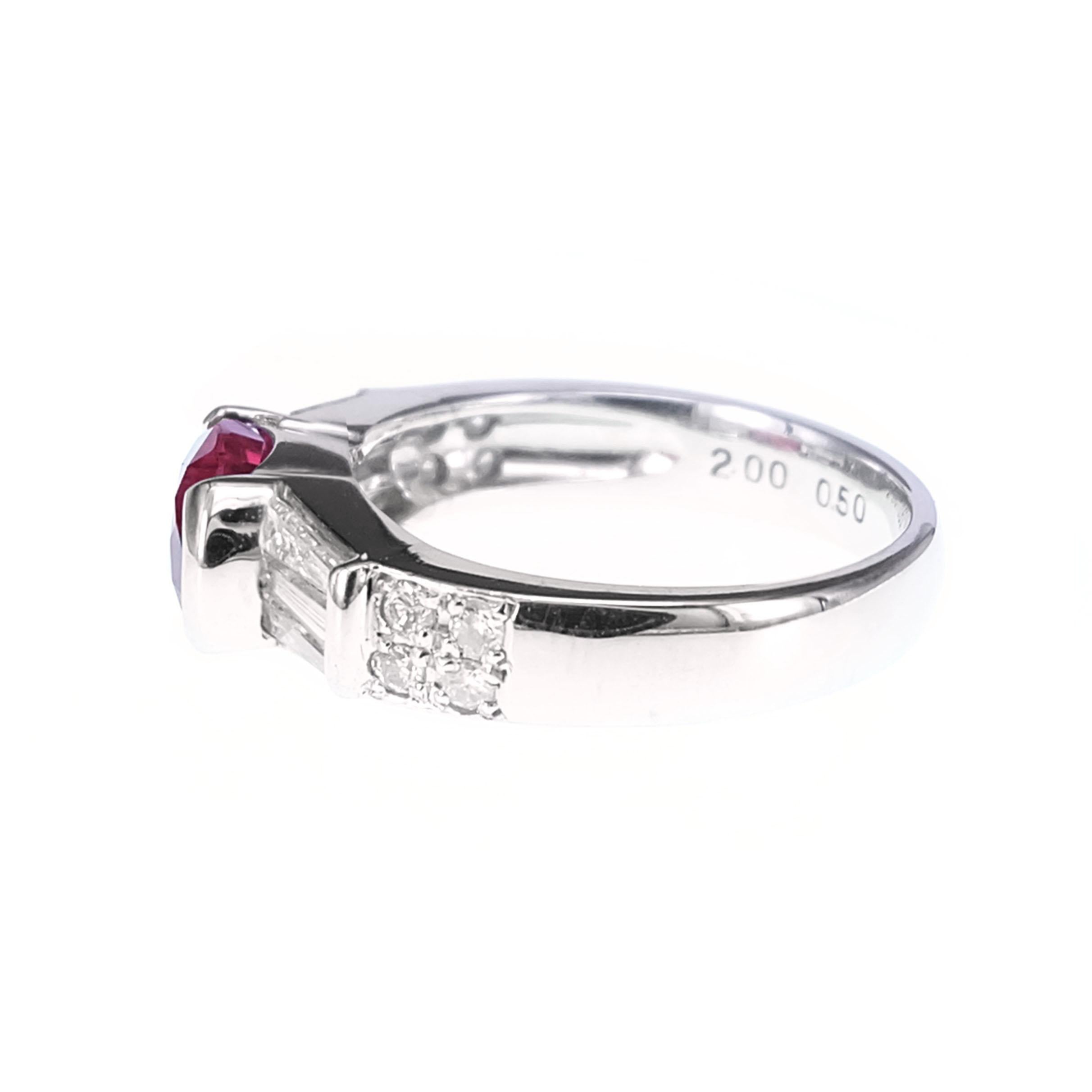 CGL Japan Lab Certified, this ring is made in Platinum 900. The ring has been set with certified two carat ruby and 0.50 carat of baguette and white round brilliant diamond. Details of the diamond are mentioned below:
Color: D
Clarity : VVS
Ring