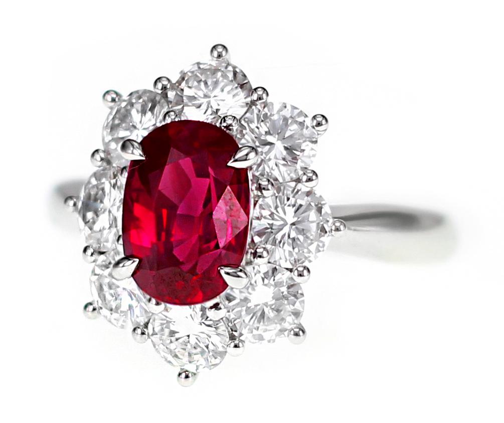 2.32 carat natural ruby certified by Central gem Laboratory of Japan is set  along with 1.87 carat of white brilliant round diamond. 
The details of the diamond are as follows:
Color: D
Clarity: VVS
Ring Size: US 6.25
The image of the certificate is