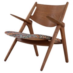 CH 28 - Butaca "Sawbuck Chair" de roble de Hans J. Wegner