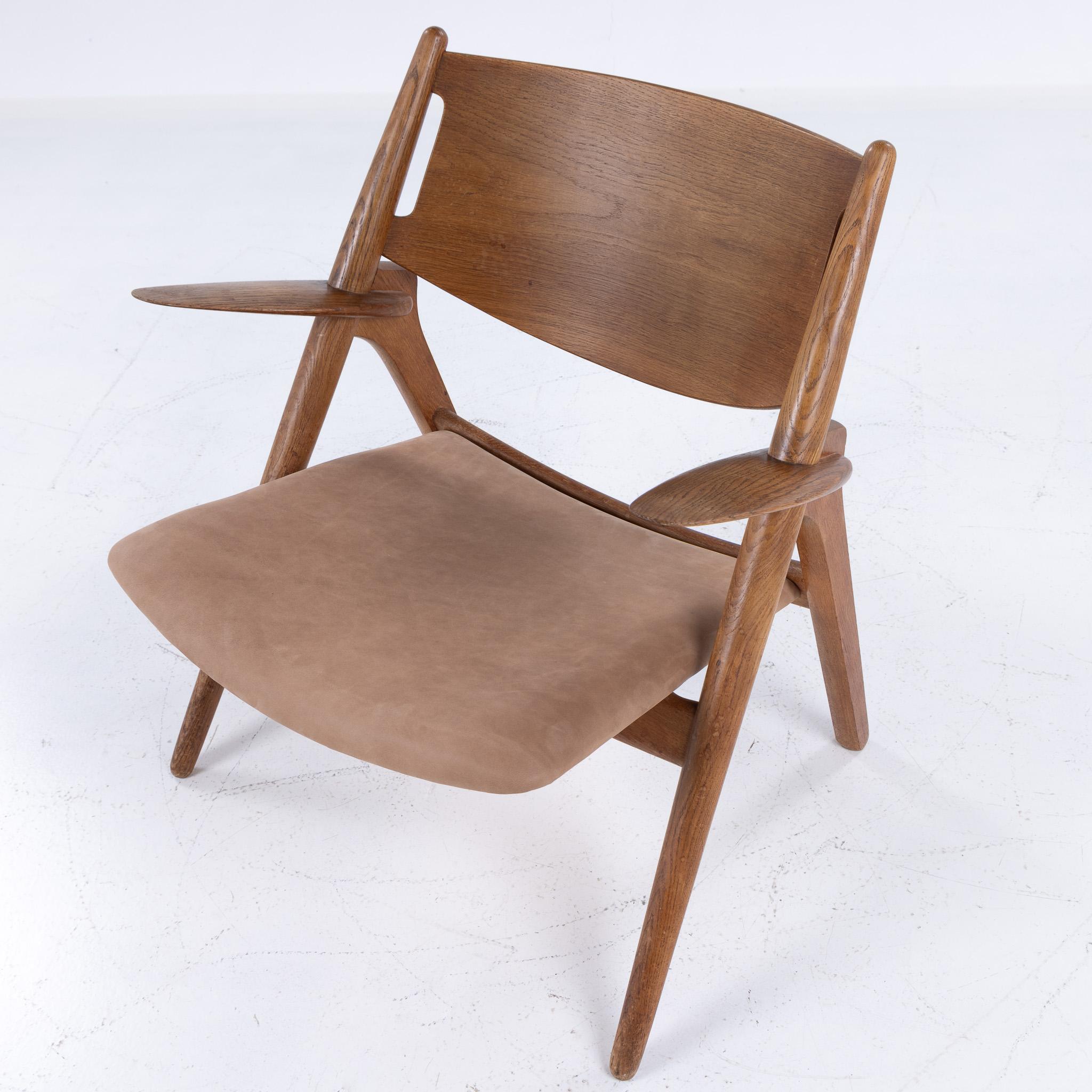 Danish CH 28 - 'Sawbuck chair' in patinated oak by Hans J. Wegner For Sale