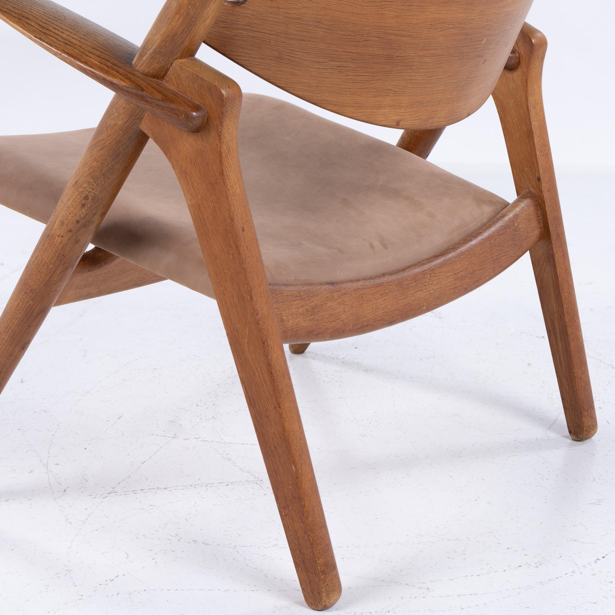 Leather CH 28 - 'Sawbuck chair' in patinated oak by Hans J. Wegner For Sale