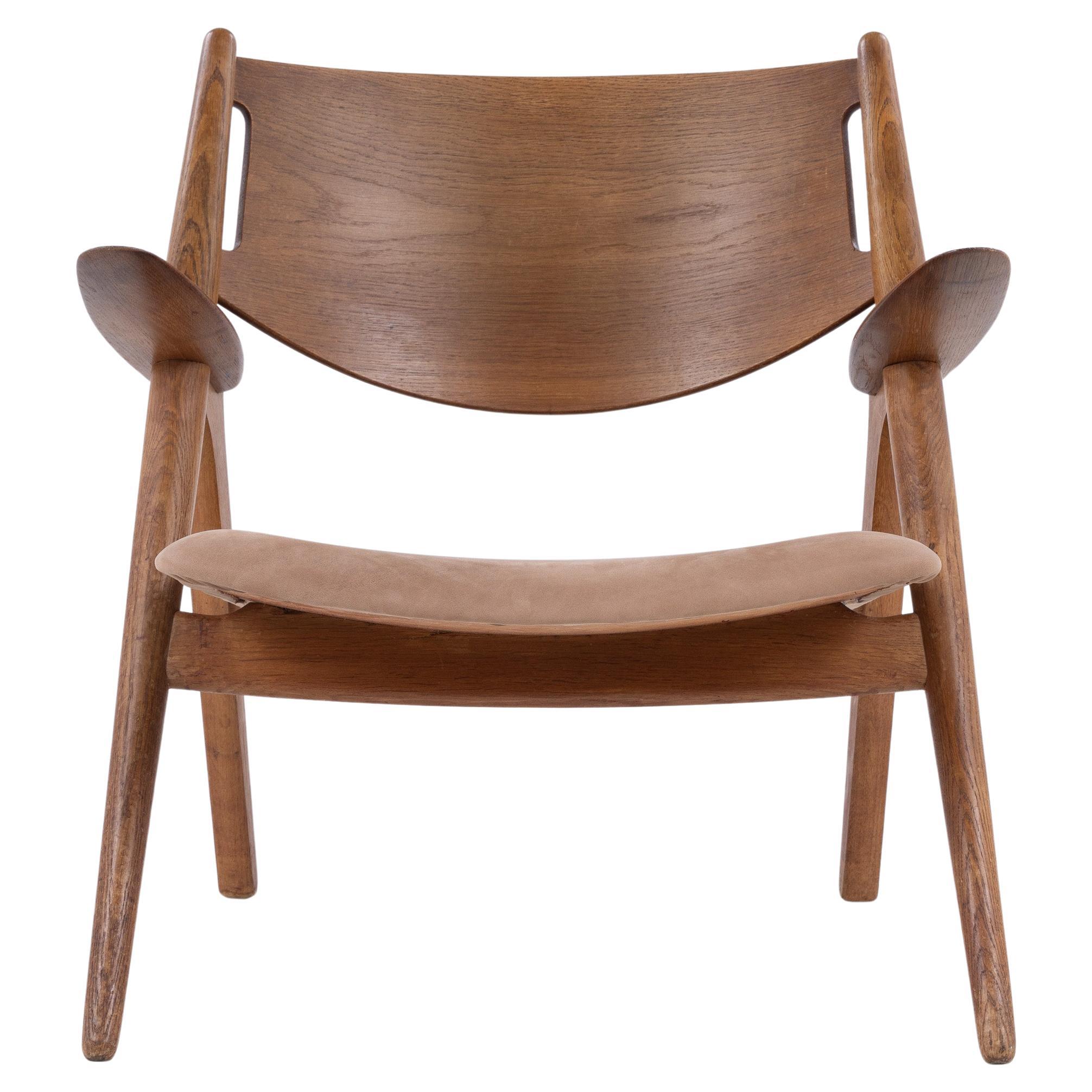 CH 28 - "Chaise Sawbuck" en chêne patiné de Hans J. Wegner