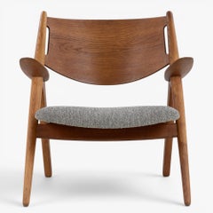CH 28 - 'Sawbuck' easy chair in oak by Hans J. Wegner