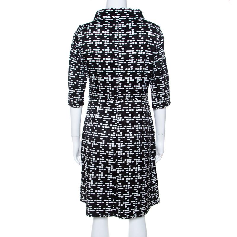 This CH Carolina Herrera dress is made from quality fabrics and styled to help you look classy. It brings mid sleeves, a portrait collar and prints of black and white all over. The dress will look great with pumps and a top handle bag.

