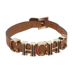 CH Carolina Herrera Logotipo CH Esmaltado Marrón Piel Marrón Tono Oro Pulsera