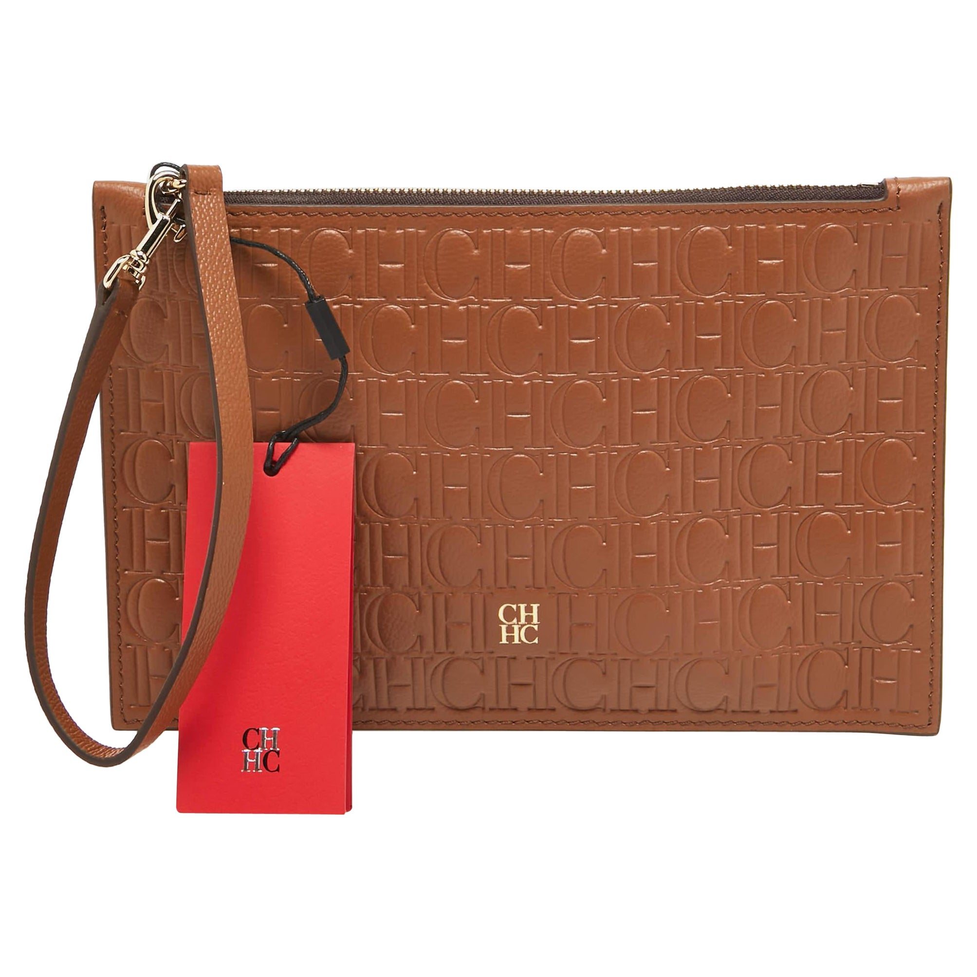 CH Carolina Herrera Brown Monogram Embossed Leather Wrsitlet Clutch