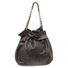 CH Carolina Herrera Dark Brown Embossed Leather Bow Bucket Bag