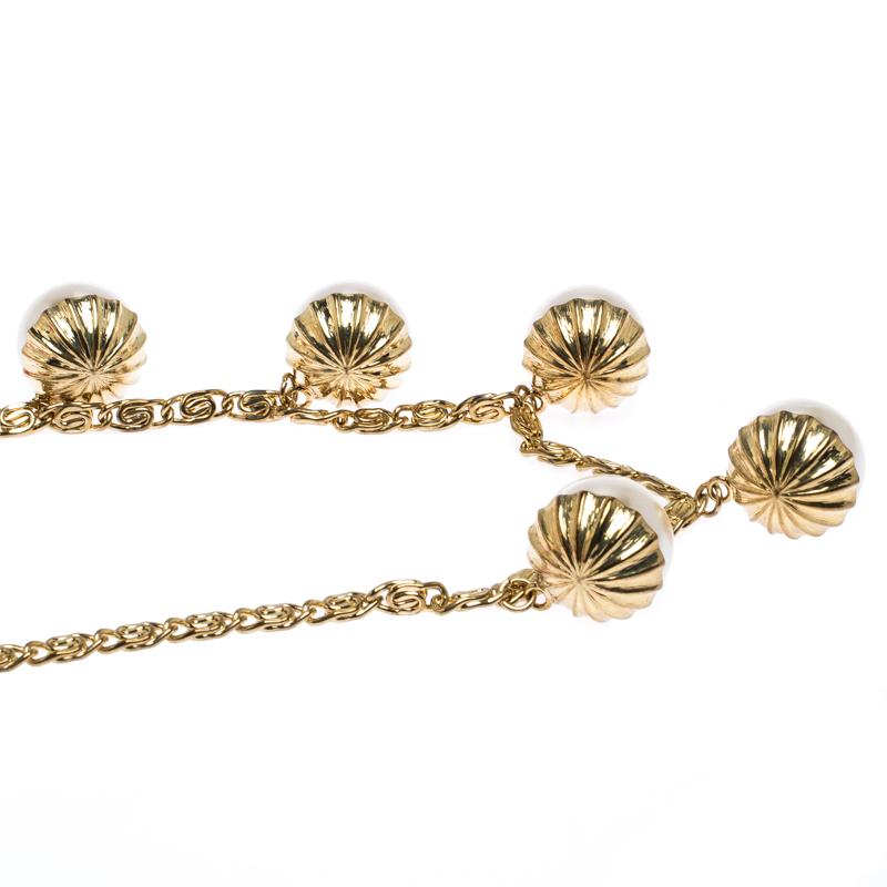 Assembled with five faux pearls towards the front, this necklace from CH Carolina Herrera has an elegant retro vibe. It is feminine and so well-made from gold-tone metal into a long design that it will surely shine when you wear it with off-shoulder