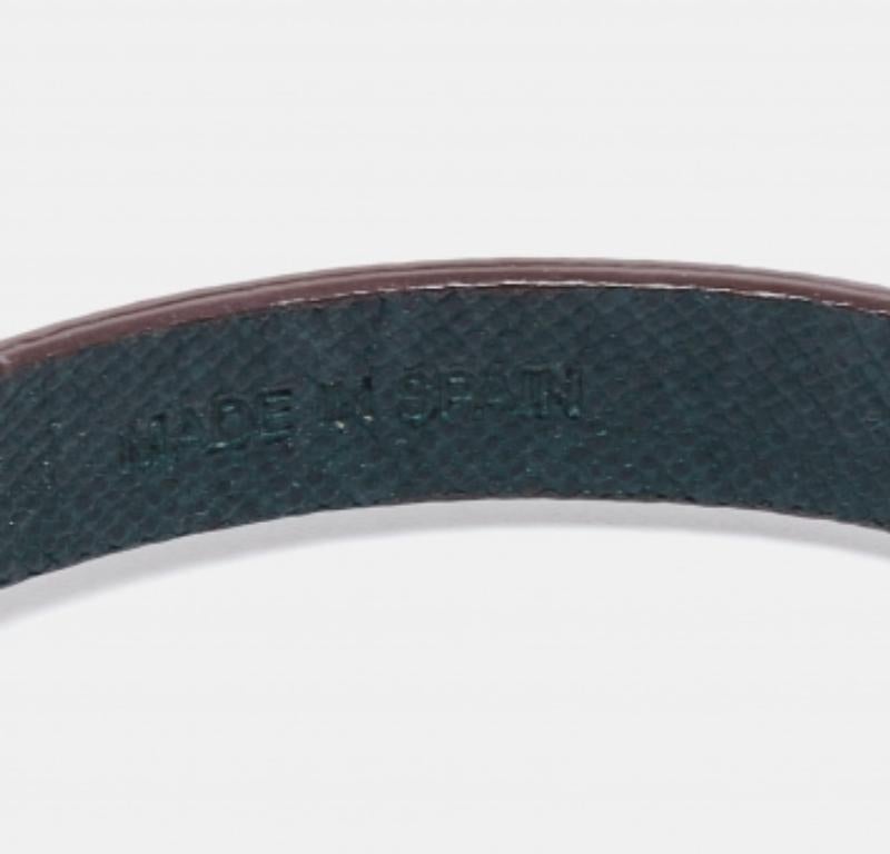 CH Carolina Herrera Forest Green Leather Logo Charms Wrap Bracelet In Fair Condition For Sale In Dubai, Al Qouz 2