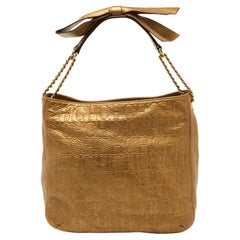 CH Carolina Herrera Gold Embossed Monogram Leather Chain Bow Hobo