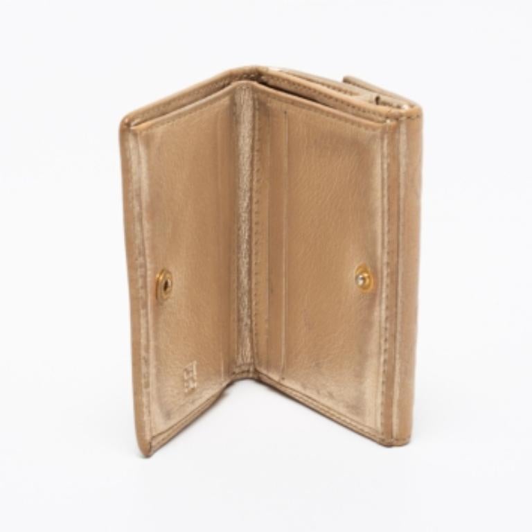 Women's CH Carolina Herrera Gold Floral Embossed Leather Flap Compact Wallet For Sale