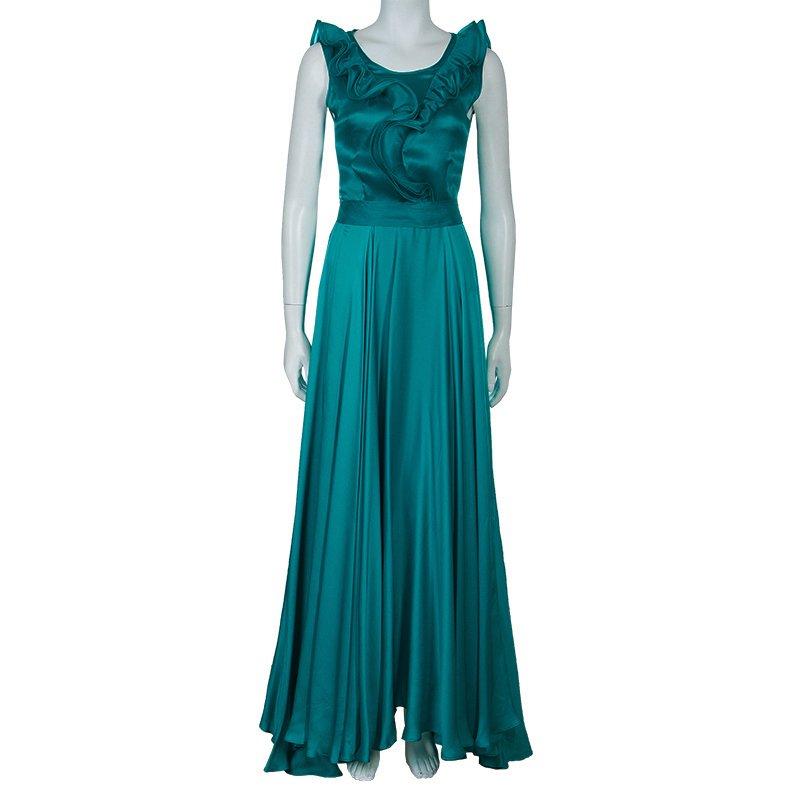 This CH Carolina Herrera gown is best chosen for its classical refined look. With ruffled front, this green gown is cut from silk. It has slim-fit bodice, full skirt, a waist belt that is tied at the back. Hem of this sleeveless gown falls to the