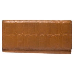 CH Carolina Herrera Mustard Monogram Embossed Leather Trifold Continental Wallet