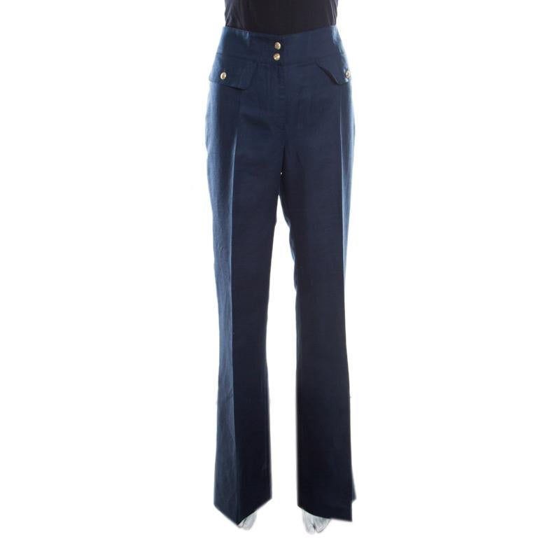 Aren't these high waisted CH Carolina Herrera trousers just lovely? The navy blue trousers are made of a cotton and linen blend and feature a flared bottom silhouette. They flaunt dual front button fastenings with brand logo detailing, and come