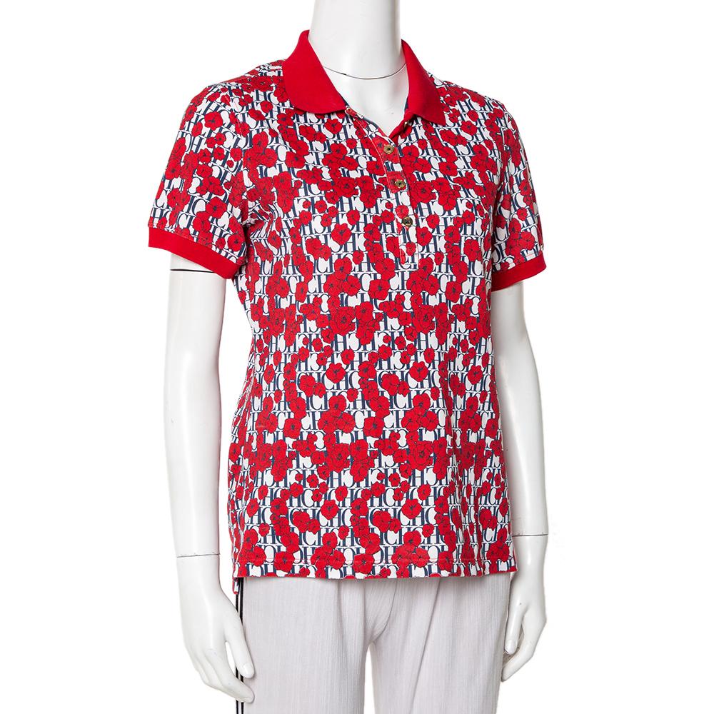 CH Carolina Herrera's Polo T-shirt ensures comfort with a simple yet luxe tone of style. It is made from cotton and designed with short sleeves, buttons, a simple collar, and a mix of CH logo and floral prints laid all over. The T-shirt will work