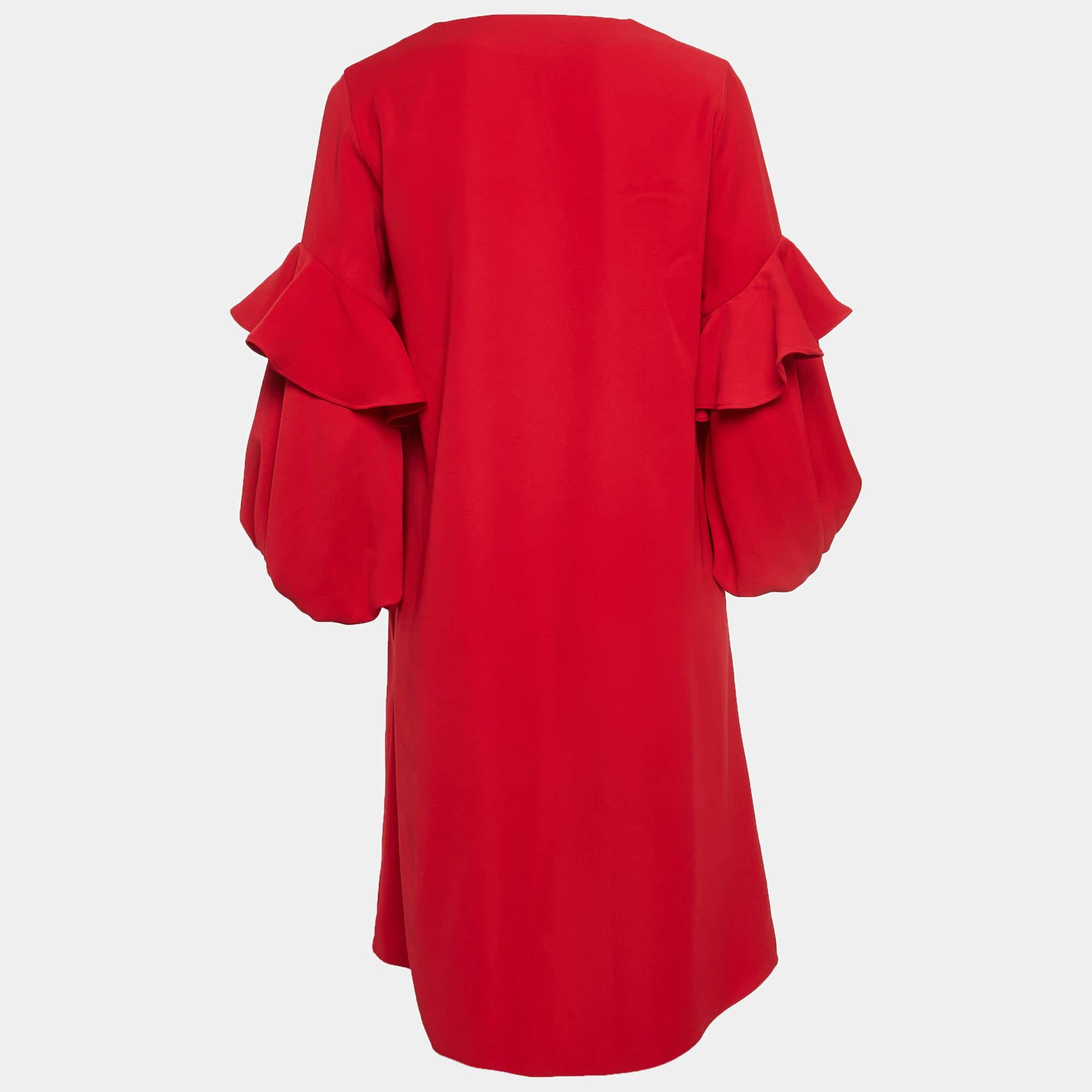 Exhibit a stylish look by wearing this beautiful designer dress. Tailored using fine fabric, this dress has a chic silhouette for a framing fit. Style the creation with chic accessories and pumps.