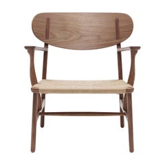 CH22 Lounge Chair in Wood with Natural Papercord Seat by Hans J. Wegner