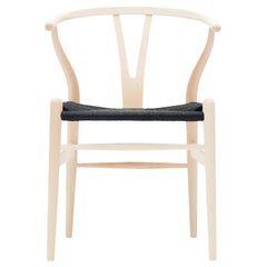 CH24 Wishbone Chair in Wood Finishes with Black Papercord Seat by Hans J. Wegner