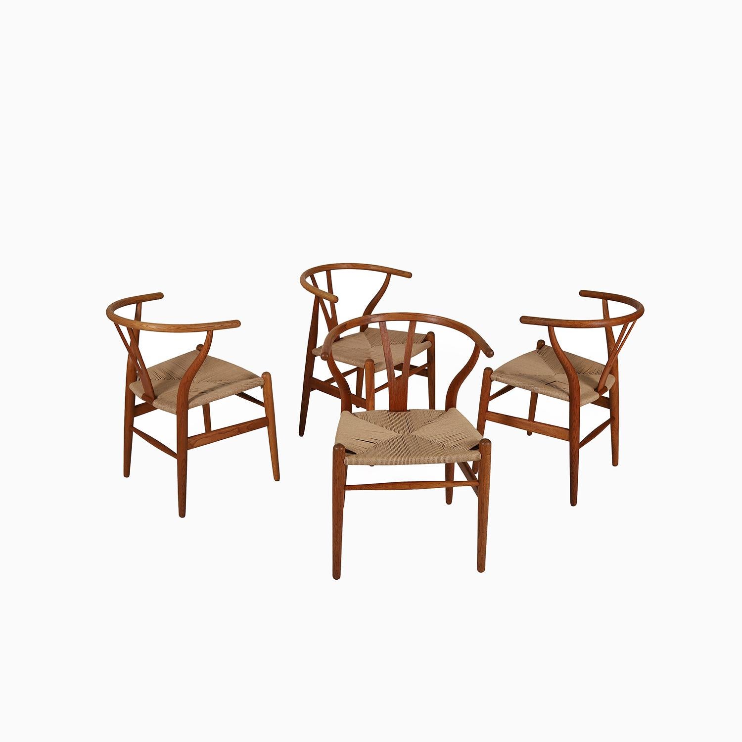 20th Century CH24 Wishbone Chairs in vintage oak by Hans J Wegner - Set of 4