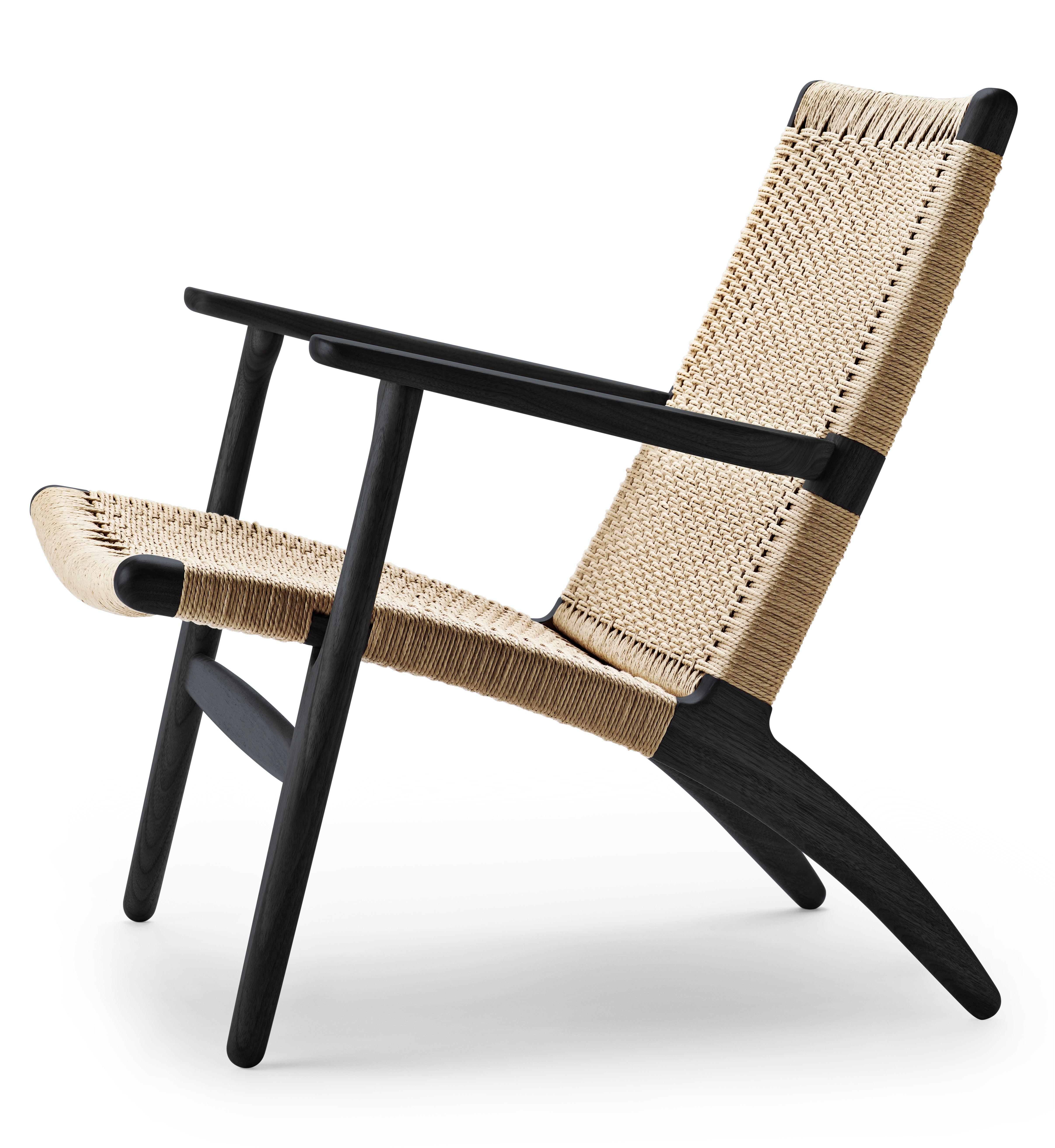 The CH25 lounge chair, like many of Hans J. Wegnerâ€™s other iconic designs, is clean and simple in its distinctive shape. But its introduction caused a stir due to Wegnerâ€™s choice of materials on the backrest and seat. The woven paper cord, a