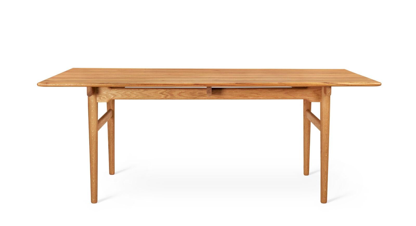 Hans J. Wegner’s CH327 6-person dining table from 1962 has an unusual design where the tabletop appears almost to be floating. The CH327T leaf is sold separately. Please inquire for more details.