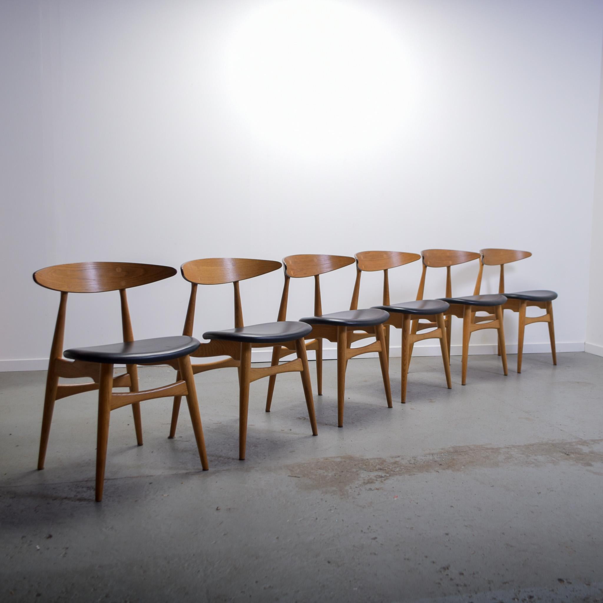 Mid-Century Modern CH33 dining chairs designed by Hans J. Wegner for Carl Hansen
