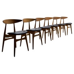 CH33 dining chairs designed by Hans J. Wegner for Carl Hansen