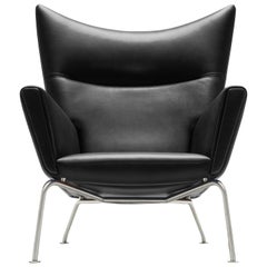 CH445 Wing Chair in Leather with Stainless Steel Base by Hans J. Wegner