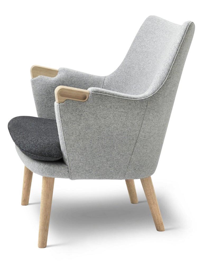 With its slender frame and flowing, sculptural form, Hans J. Wegnerâ€™s CH71 lounge chair is a testament to the legendary Danish designerâ€™s unique understanding of woodworking and upholstery. Created in 1952, the design shows all the hallmarks of