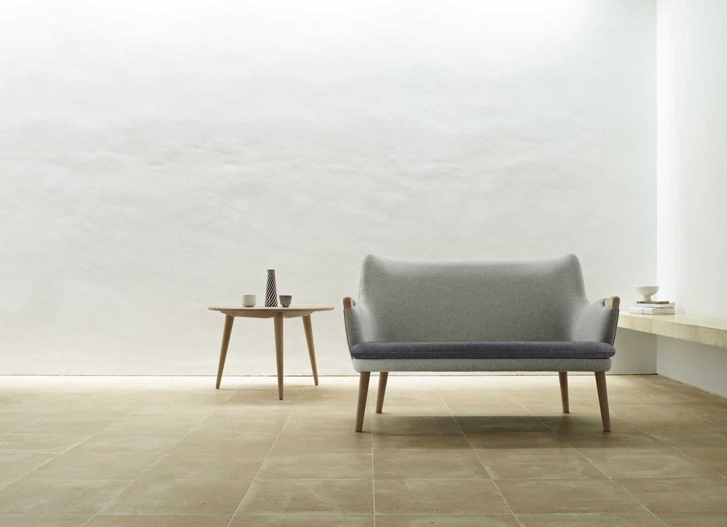 CH72 SOFA By Hans J. Wegner for Carl Hansen & Son

Hans J. Wegner designed the CH72 sofa in 1952, drawing on expertise in cabinetmaking and upholstery. The result is a finely crafted, fluid design that appears as striking today as it did over half