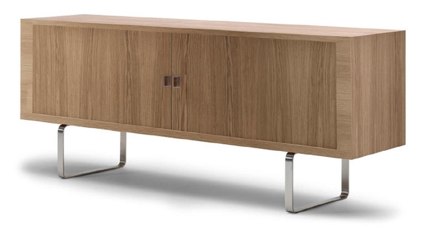 The CH825 credenza was designed by Hans J. Wegner as part of a series of three and it soon became a popular item at auctions, valued for its style and functionality. In 2014, Carl Hansen & SÃ¸n relaunched the design based on Wegnerâ€™s original