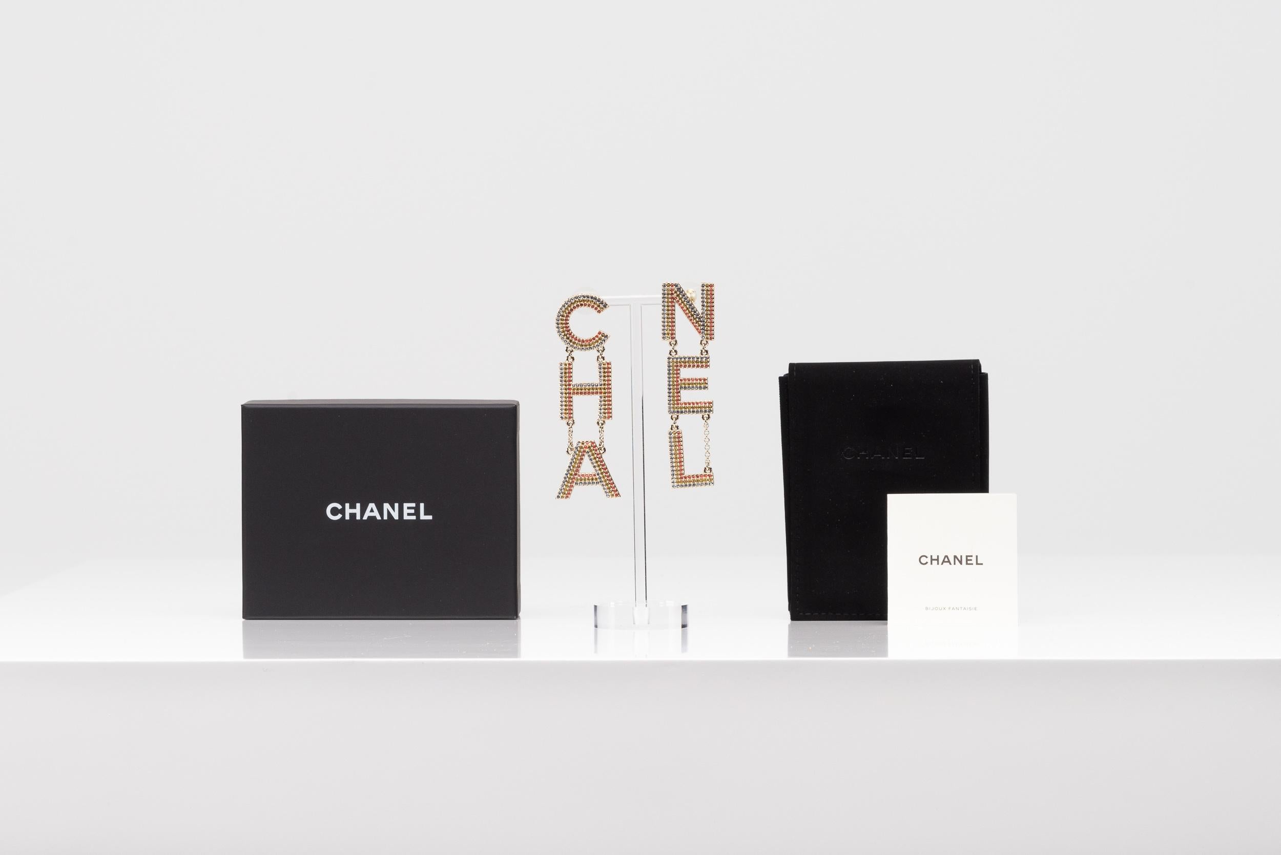From the collection of SAVINETI we offer these Chanel Logo Earrings:
-	Brand: Chanel
-	Model: CHA NEL earrings rainbow
-	Year: 2023
-	Condition: New
-	Extras: comes with the original Chanel box & bag

These awesome Chanel earrings are from the 2023
