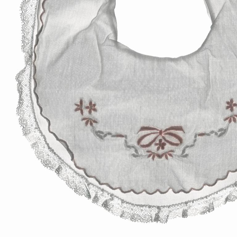 Aliboo Bib: Still Life Photograph of White & Pink Child's Embroidered Clothing - Gray Still-Life Photograph by Chad Kleitsch
