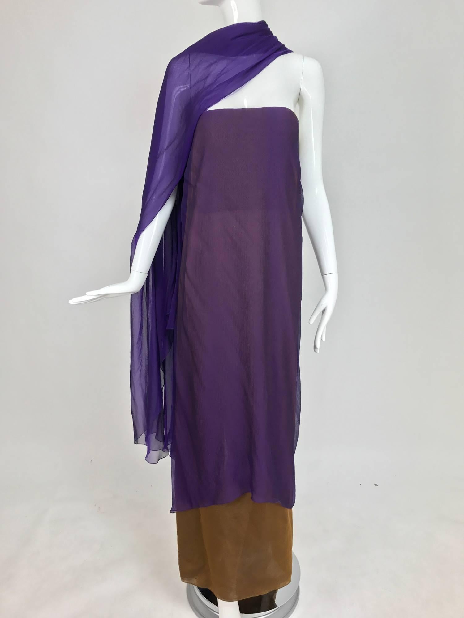 Chado Ralph Rucci silk chiffon strapless layered, draped gown with train in purple and tobacco brown. Three layers of iridescent silk chiffon, the strapless column gown has a deep center back hem vent, attached at the back is a long purple silk