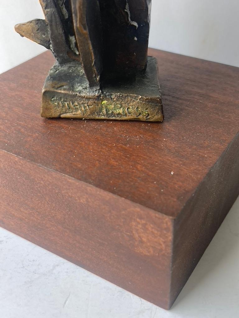 Traditional and very well known art work by the well known artist Chaim Gross. This is a known work for the artist . The biblical burning bush .Signed on the side of bronze as shown.