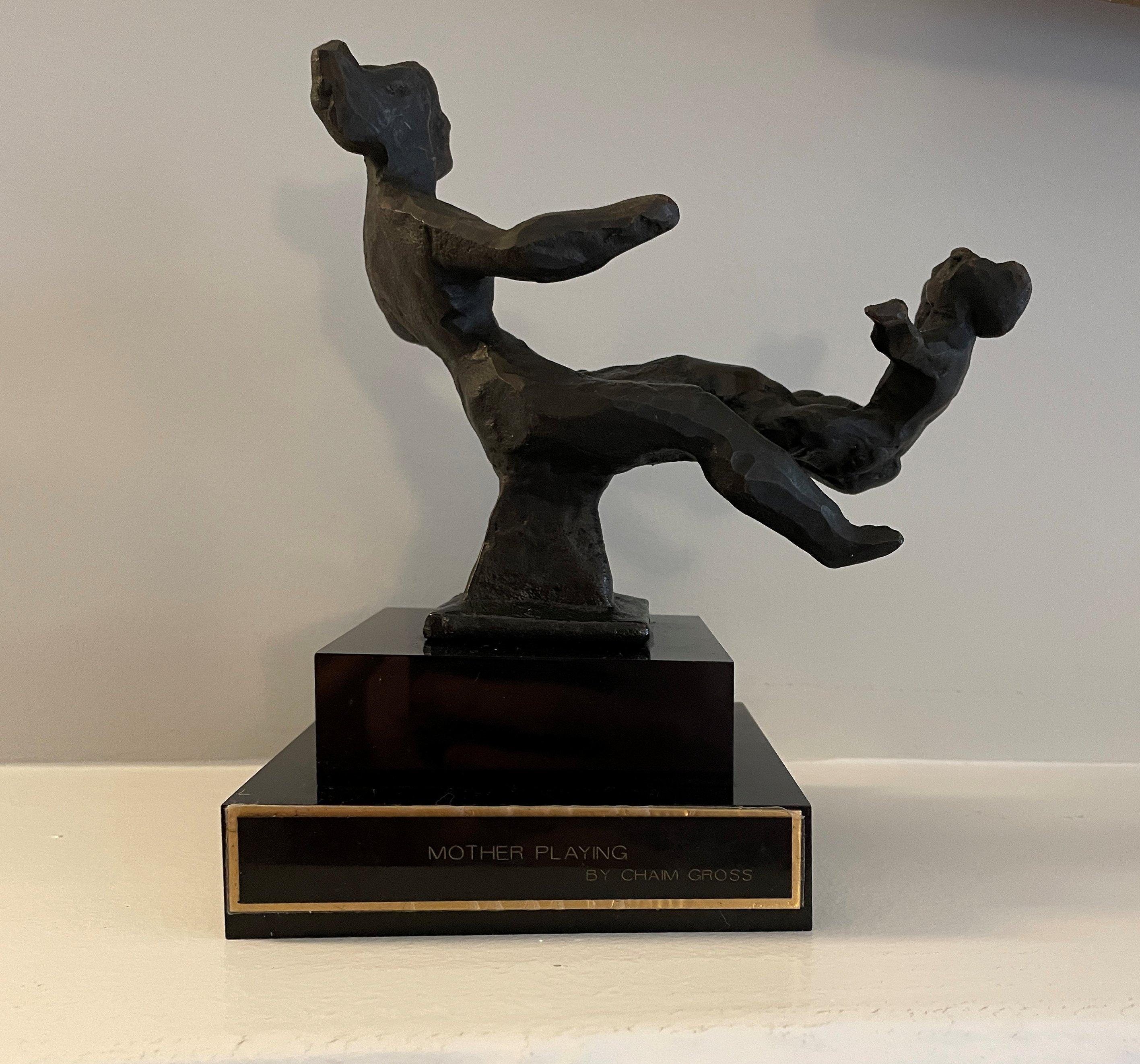 Chaim Gross (1904 - 1991)
Mother Playing
Bronze
5 x 6 x 4 inches
Edition 1/8
Signed and numbered

Provenance:
Louis H. Barnett, Fort Worth, Texas

A sculptor originally from Austria, Chaim Gross is best known for his lively, naturalistic, often