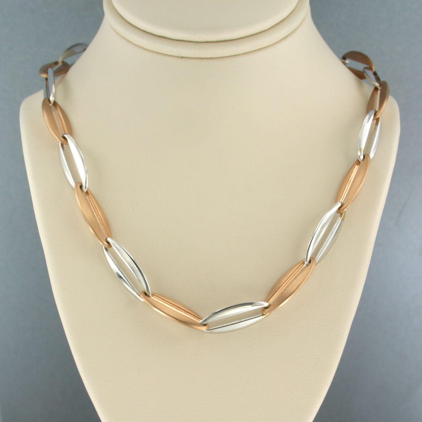 14k bicolour gold link necklace - 45 cm long

detailed description:

necklace is 45 cm long and 0.7 cm wide

total weight: 16.0 grams

hallmark present, tested and guaranteed 14k gold

necklace is in good condition
B14704