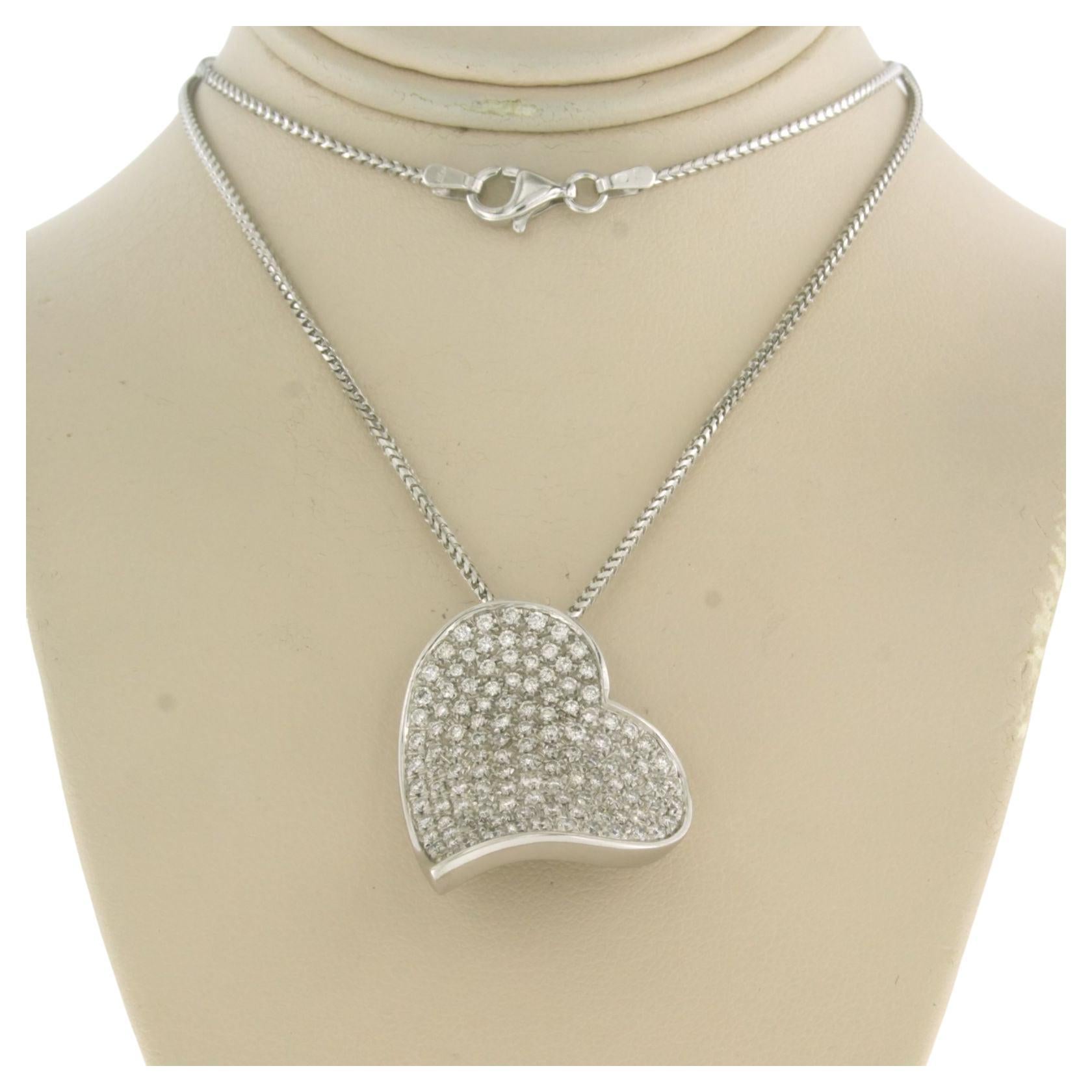 Chain and pendant in shape of a heart set with diamonds 18k white gold For Sale