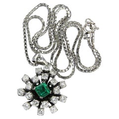Chain and pendant set with emerald and diamonds up to 1.96ct 14k white gold