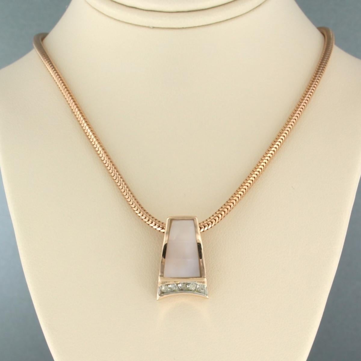 14k pink gold necklace with a bicolor gold pendant set with mother of pearl and brilliant cut diamonds. 0.15ct - 38cm long

detailed description:

The necklace is 37 cm long and 2.3 mm wide

the pendant is 1.9 cm high and 1.2 cm wide

Weight 18.4