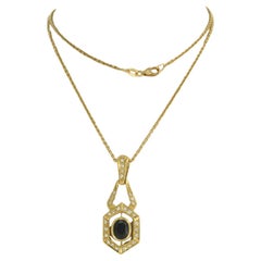 Chain and pendant set with Sapphire up to 0.70ct and diamonds 18k yellow gold